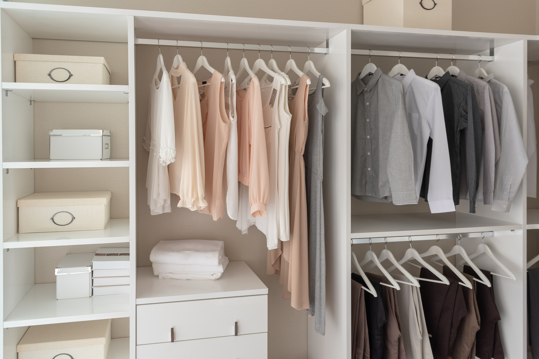 modern closet with clothes