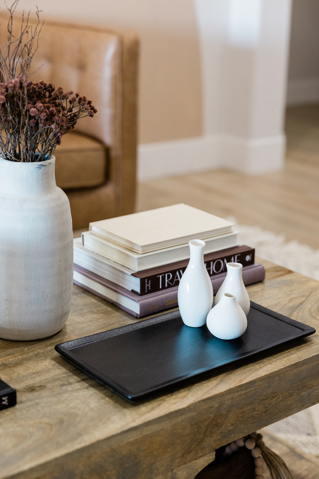 Vase, Books, and Decorative Jars on the Coffee Table